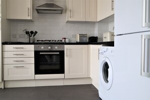 Open Plan Kitchen siting dining area