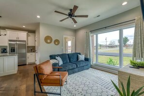 Living room featuring full size pull out couch