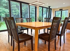 Dining room table seats 8 as is... add desk chairs to seat 10 if desired.