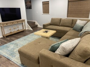 Living room with pull out sofa for extra sleeping arrangement.