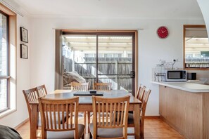 Come together around the dining table or use this space for setting up a laptop if you’re on a working holiday.