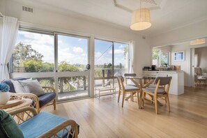 The dining area offers a cosy seating nook, perfect for curling up with your favourite book.