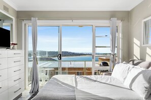 Wake up to soaring blue skies and ocean views from the double-size bed, or sleep in with curtains for shade. 
