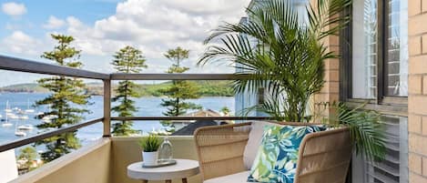 Take in water views straight from the balcony, an idyllic spot to watch the sunrise over your morning coffee.