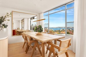 Savour the view of Sydney’s Harbour while enjoying a meal with friends and family in the dining space. 