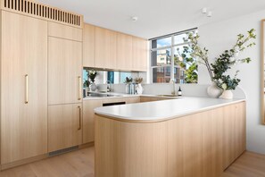 A cooking haven with modern appliances and sleek design, inspiring culinary creativity.