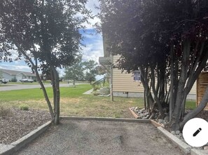 Parking Space under trees.  Additional parking off the street.