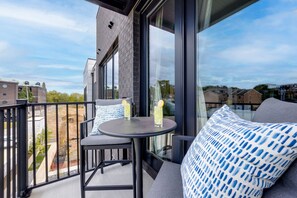 Private outdoor patio with outdoor seating.