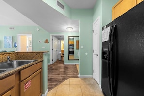Fully stocked kitchen. Bunk room entry