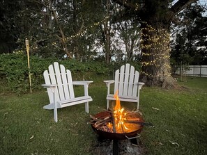 Cosy firepit to warm up next to during the cooler months.
