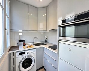 Enjoy the convenience of a fully equipped kitchen with modern amenities