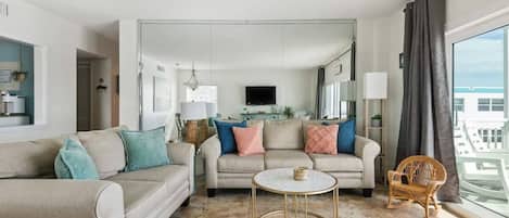 Unwind in coastal comfort with our plush sofas and refreshing aqua accents, perfect for relaxation after a sunny day at the beach.