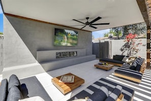 Outdoor Lounge Area with Gas Fireplace and TV