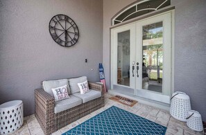 Welcome To Palm Garden Double Glass Door Entrance