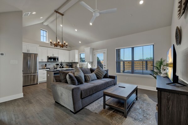 Sink into the comfy couch in the spacious living room.