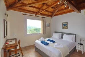 Double bedroom with A/C and en suite bathroom