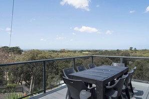 Dine alfresco on the front deck, taking in the Peninsula views and cool coastal air.