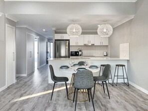 Prepare a meal for the whole family in this fully equipped kitchen with family sized fridge, microwave, toaster, kettle and coffee machine