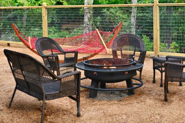 Each cabin come with its own fire pit, outdoor furniture and hammock.