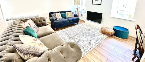 Living room with velvet sofas