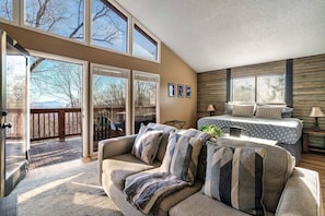 Gorgeous master bedroom suite with a private deck/ seasonal view & living area.