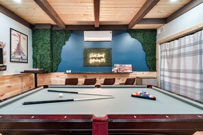 Whether playing or pulling up a stool, there's fun for all in the game room!