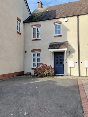 Parking spaces to the front of the property. 