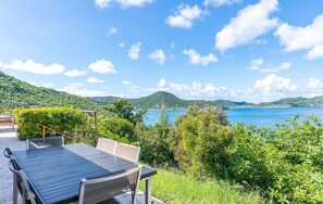 Fully equipped air conditioned kitchen, with electric oven, microwave, fridge and freezer, dishwasher, toaster, coffee machine, blender, electric kettle. Outside dining areas with a rectangular table for 6 guests on the terrace, and a wooden table under t