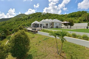Beautiful garden surrounding the property. Private parking at the entrance. 