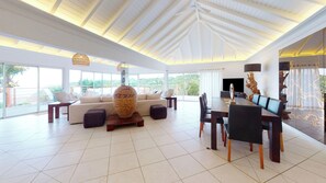 Indoor dining area next to the living room with the table for 8 guests. Outdoor dining table next to the pool. 