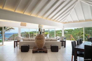 Located on the upper level. Air conditioning, ceiling fans, HD-TV, Dish Network, DVD player, telephone, iPod docking station, WIFI, safe with key. Fully equipped, breakfast bar with four black stools, fridge and freezer with ice maker, hood, gas cooker an