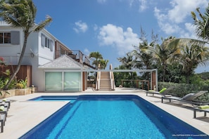 Located on the lower level. Heated pool, spacious patio with seven sun loungers. Outdoor dining table for eight.