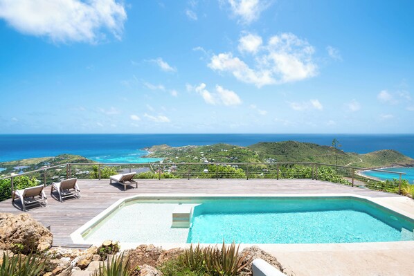 Lovely heated pool with steps, expansive terrace, sun loungers. 