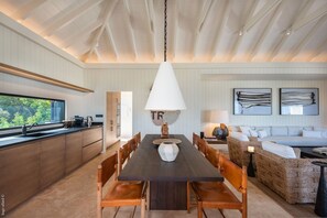 Fully equipped, blender, coffee Maker, juicer, kettle, Nespresso coffee Machine, toaster, wine cooler, 2 refrigerators, 2 seperate freezers. Indoor and Outdoor tables for 8 guests. 