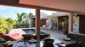 Terrace around the pool 2.5 x 6.5 m, deckchairs, covered terrace with sofas. Gas barbecue.