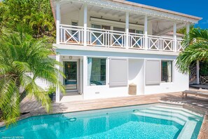 Located on the lower level. A large terrace with deckchairs surround the pool with steps. A heated jacuzzi is located nearby.