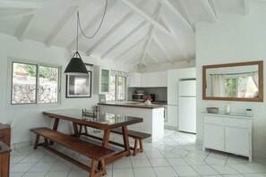 Fully equipped, gas cooker, blender, microwave, dishwasher, Nespresso coffee machine, ice machine, citrus juicer, toaster. Indoor dining table and outdoor table on the covered terrace. 