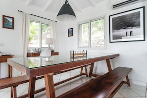 Fully equipped, gas cooker, blender, microwave, dishwasher, Nespresso coffee machine, ice machine, citrus juicer, toaster. Indoor dining table and outdoor table on the covered terrace.