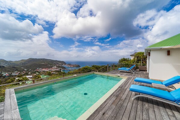 Heated pool, large terrace with deck chairs and loungers. 