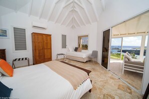 King size bed, air conditioning, additional single bed. Ensuite bathroom, sink. The bedrooms opens onto the terrace.