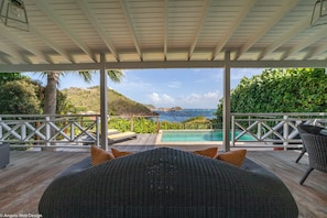 Outdoor lounge and dining area on the covered terrace. 