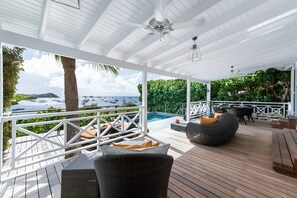 Outdoor lounge and dining area on the covered terrace. 