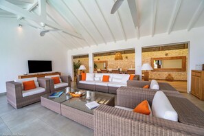 Ceiling fan, HD-TV, Dish network, Apple TV. Opens onto the terrace. Ocean view. 