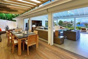 Ceiling fan, HD-TV, Dish network, Apple TV. Opens onto the terrace. Ocean view. 