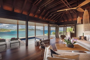Beautiful balinese style living room, ceiling fans, wifi.