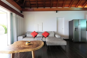 Air conditioning, ceiling fan, HD-TV, Dish network, DVD player. Opens onto the terrace.