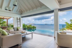 Beautiful open floor lounge areas, opening directly onto the terrace and the views. 