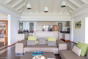 Beautiful open floor lounge areas, opening directly onto the terrace and the views.