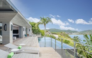 Nice heated pool, expansive terrace with loungers and deck chairs. 