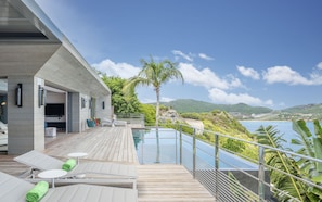 Nice heated pool, expansive terrace with loungers and deck chairs.